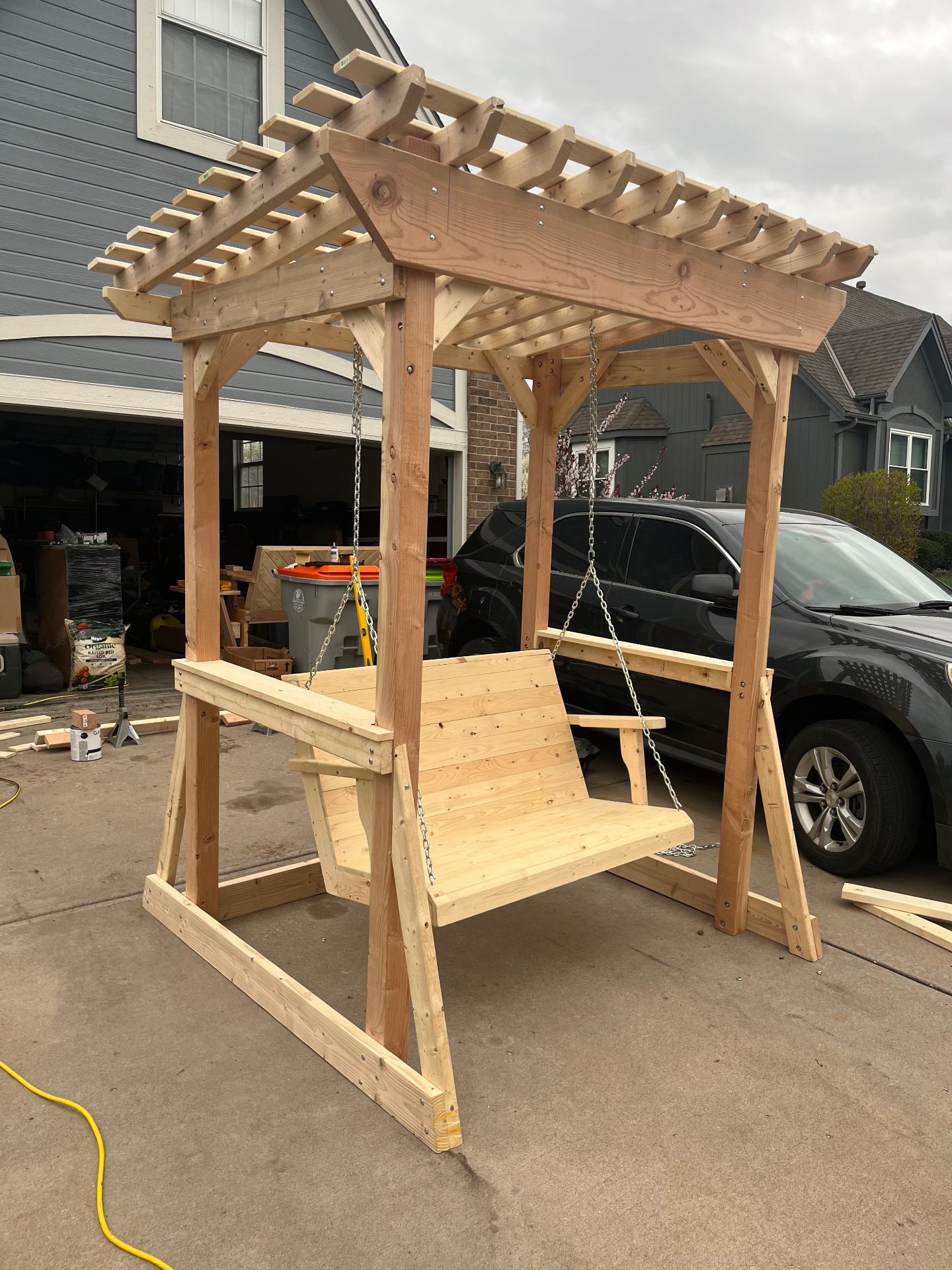 Pergola during construction showing wood joinery detail