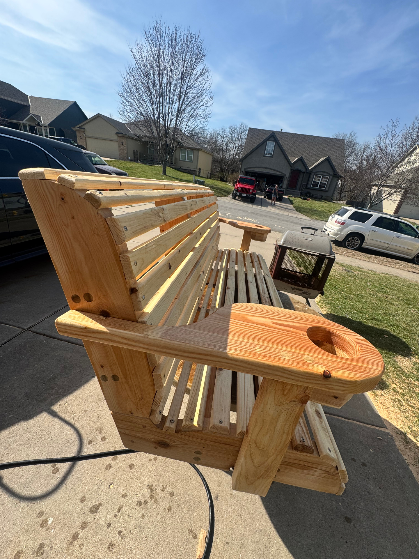 Side angle of ergonomic porch swing seat contour
