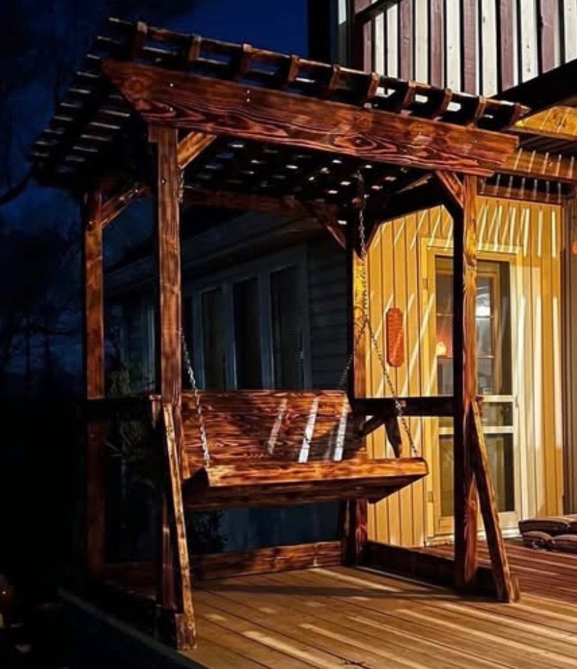 Custom-built wooden pergola at golden hour